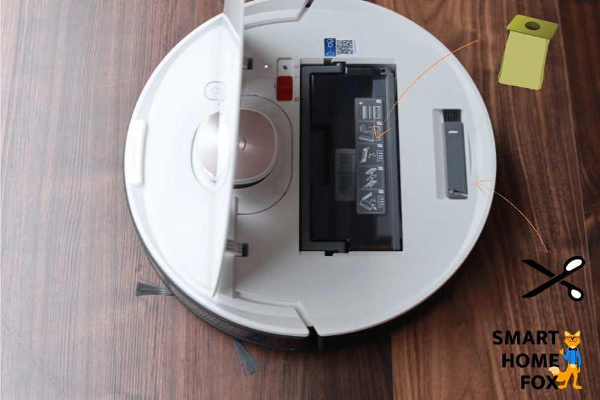 You can find the cleaning tool of ecovac’s robot vacuums under the lid.